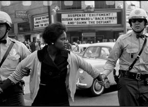 Bruce Davidson - USA. Alabama. Birmingham. 1963. Arrest of a demonstrator. „Damn the Defiant!“